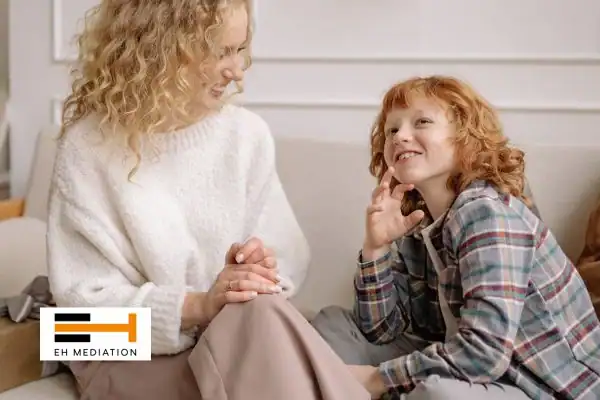 Happy mother and child after sorting child arrangements mediation Newport